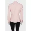 Pink jacket with golden buttons