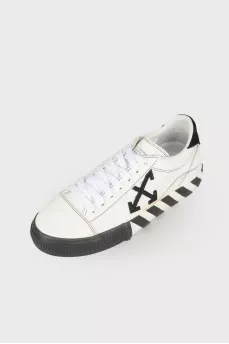 Sneakers black and white Vulcanized, with a tag