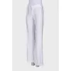 Pleated flared trousers