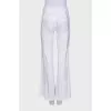 Pleated flared trousers