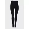 Black leggings with a zip at the bottom