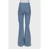 High waisted blue trousers