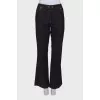 Black jeans with gold stitching