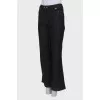 Black jeans with gold stitching