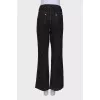 Black jeans with gold stitching