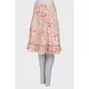 Skirt with pleated hem