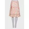 Skirt with pleated hem