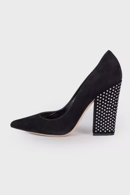Suede shoes are decorated with rhinestones