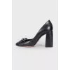 Black shoes with a bow