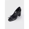 Black shoes with a bow