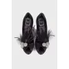 Textile shoes with rhinestones and feathers
