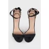 Black sandals with a flower