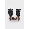 Black sandals with a flower