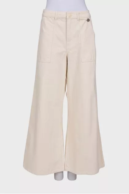 Beige palazzo trousers with tag
