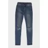 Blue jeans with ripped effect