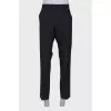 Men's classic black trousers with a tag