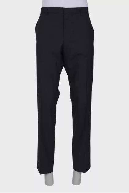Men's classic black trousers with a tag