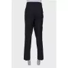 Men's classic black trousers with a tag