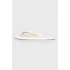 White rubber slippers