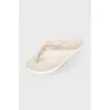 White rubber slippers