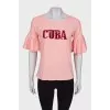 Pink T-shirt with ruffle sleeves