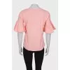Pink T-shirt with ruffle sleeves