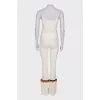 Beige suit with bright stripes
