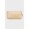Gold tone leather clutch