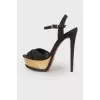 Sandals with golden platform