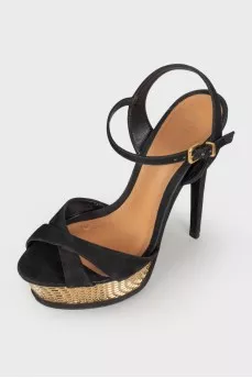 Sandals with golden platform
