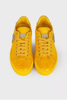 Yellow metal skull sneakers