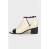 Peep-toe patent leather boots