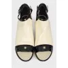 Peep-toe patent leather boots
