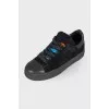 Black lace-up sneakers