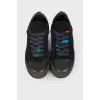 Black lace-up sneakers