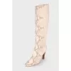 Snakeskin embossed boots