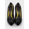 Peep-toe patent leather shoes