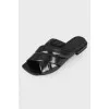 Black leather slippers