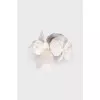 White accessory in the shape of a flower
