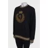 Sweatshirt with embroidered tag