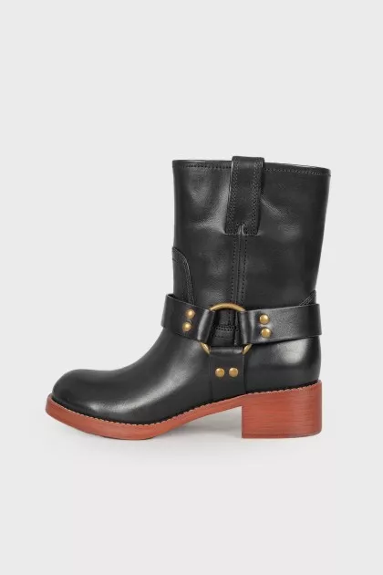 Leather boots with wooden soles