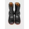 Leather boots with wooden soles