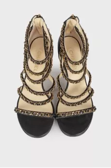 Leather sandals with gold chains