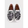 Black and white lace slip-ons