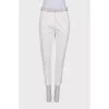 White trousers with gray-gold waist