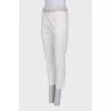 White trousers with gray-gold waist