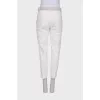 White trousers with gray-gold waist