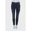 Painted and distressed jeans