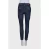 Painted and distressed jeans