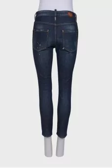 Painted and distressed jeans